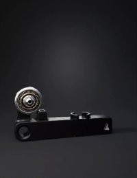 3d model: black mounting bracket with bearing clamp features metallic and plas